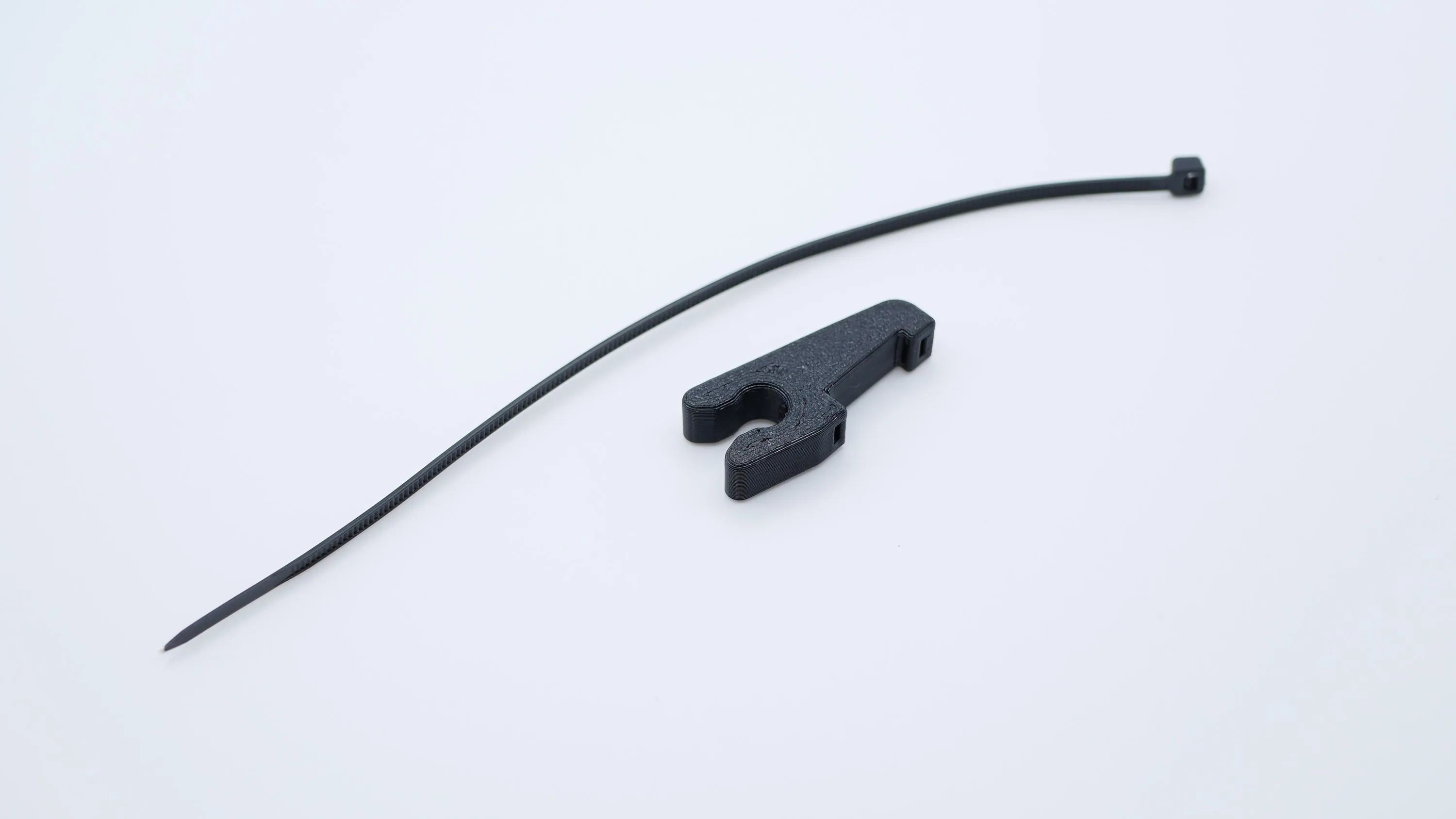 LWCG Crossover Tether Keeper